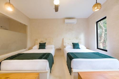 Koos Tulum Hotel Екстериор снимка